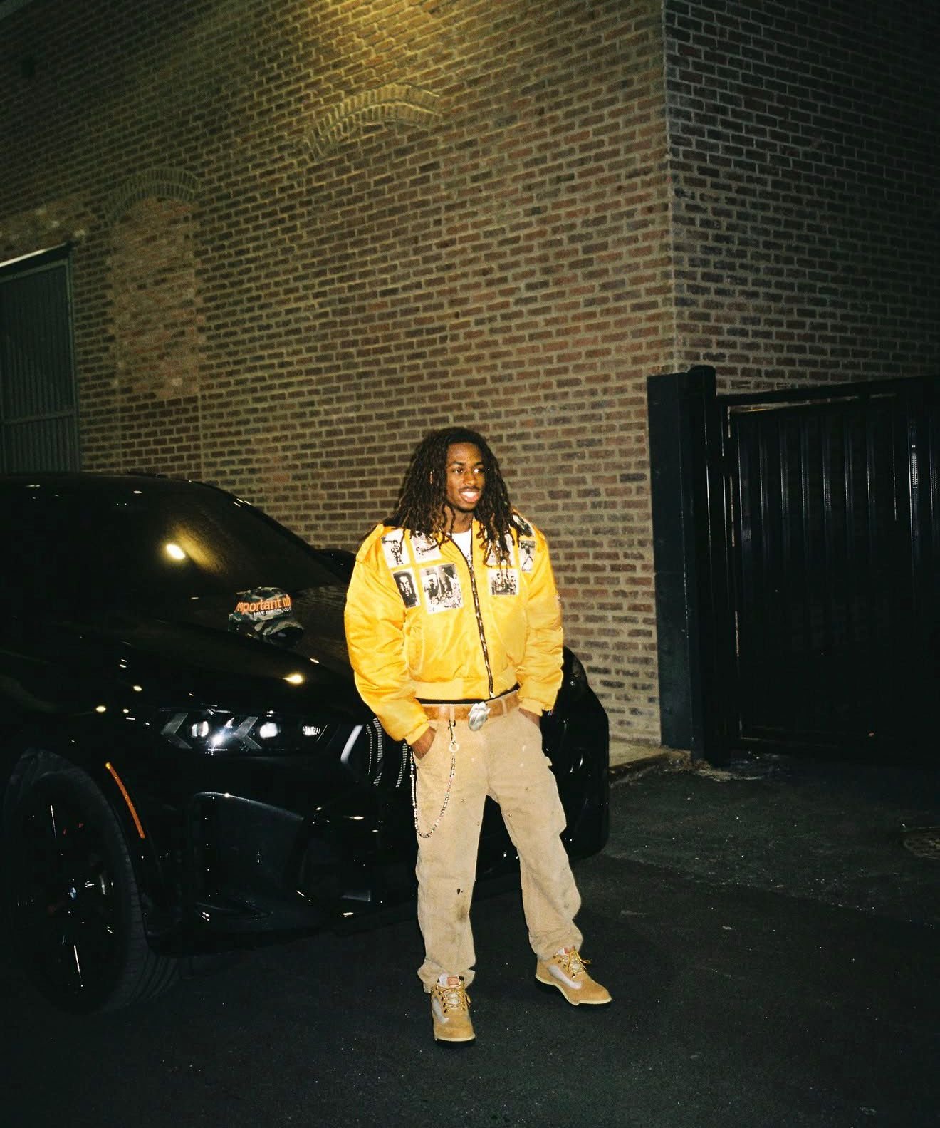 Yellow photo-print bomber jacket at night